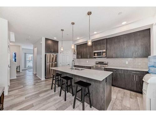 144 Lucas Street Nw, Calgary, AB - Indoor Photo Showing Kitchen With Stainless Steel Kitchen With Upgraded Kitchen