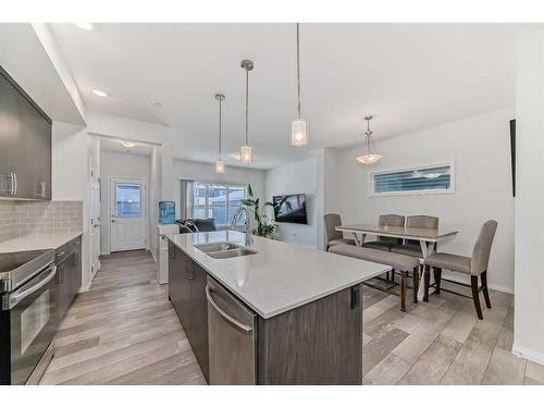 144 Lucas Street Nw, Calgary, AB - Indoor Photo Showing Kitchen With Double Sink With Upgraded Kitchen