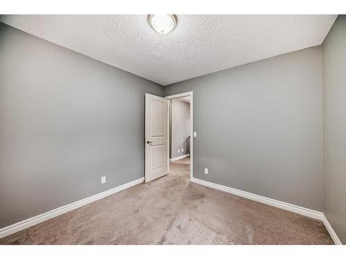 183 Hillcrest Circle Sw, Airdrie, AB - Indoor Photo Showing Other Room