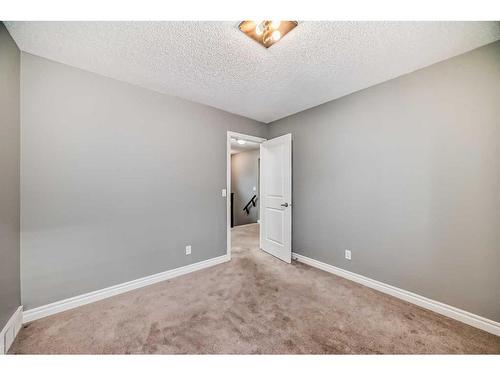 183 Hillcrest Circle Sw, Airdrie, AB - Indoor Photo Showing Other Room