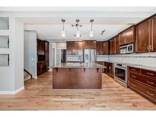 183 Hillcrest Circle Sw, Airdrie, AB - Indoor Photo Showing Kitchen