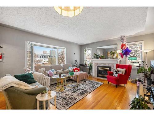 1003 Cameron Avenue Sw, Calgary, AB - Indoor Photo Showing Living Room With Fireplace