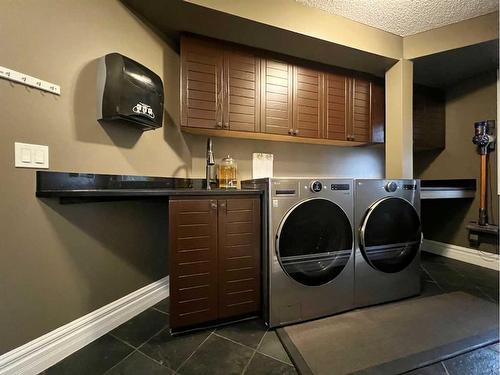 27 Calling Horse Estates, Rural Rocky View County, AB - Indoor Photo Showing Laundry Room