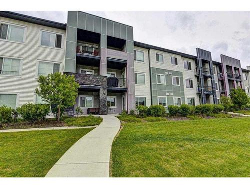 105-12 Sage Hill Terrace Nw, Calgary, AB - Outdoor With Balcony With Facade