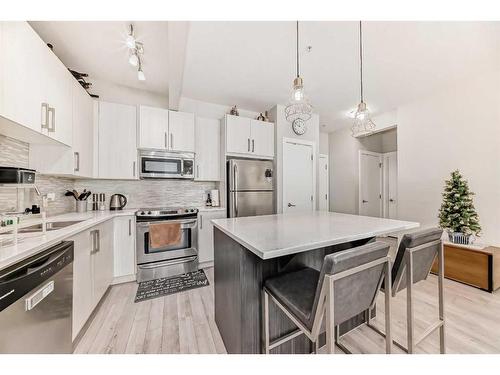 105-12 Sage Hill Terrace Nw, Calgary, AB - Indoor Photo Showing Kitchen With Stainless Steel Kitchen With Double Sink With Upgraded Kitchen