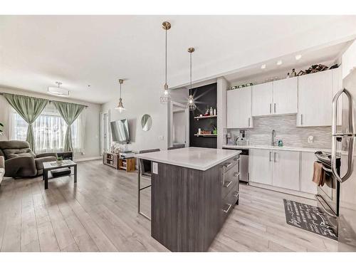 105-12 Sage Hill Terrace Nw, Calgary, AB - Indoor Photo Showing Kitchen With Stainless Steel Kitchen With Upgraded Kitchen