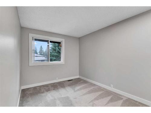 3-310 Brookmere Road Sw, Calgary, AB - Indoor Photo Showing Other Room