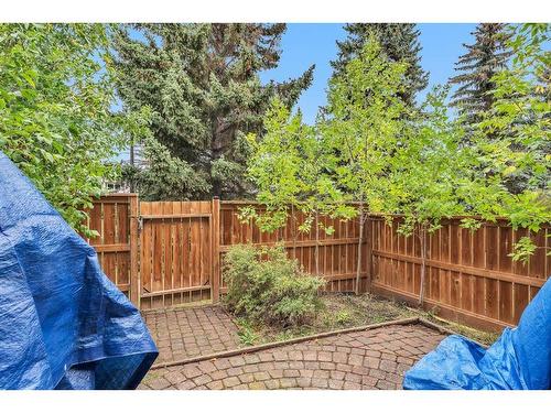 3-310 Brookmere Road Sw, Calgary, AB - Outdoor With Backyard