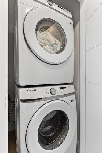 211-10060 46 Street Ne, Calgary, AB - Indoor Photo Showing Laundry Room