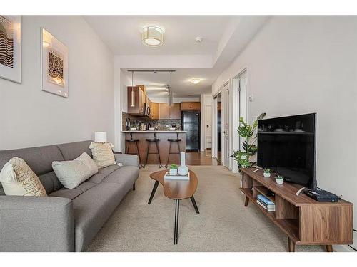 1505-1320 1 Street Se, Calgary, AB - Indoor Photo Showing Living Room