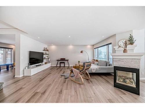 33 Royal Crest Terrace Nw, Calgary, AB - Indoor Photo Showing Living Room With Fireplace