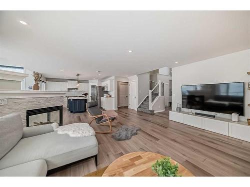 33 Royal Crest Terrace Nw, Calgary, AB - Indoor Photo Showing Living Room With Fireplace