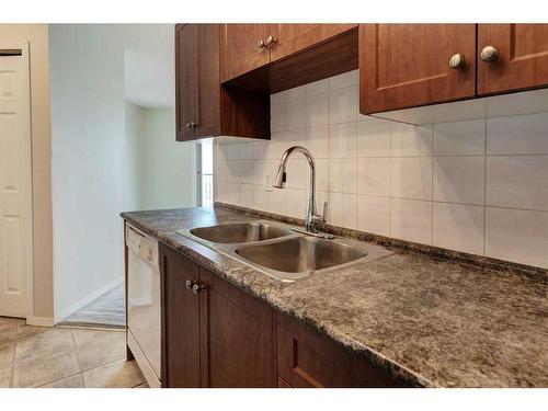 2317-8 Bridlecrest Drive Sw, Calgary, AB - Indoor Photo Showing Kitchen With Double Sink