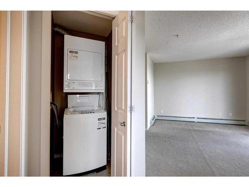 2317-8 Bridlecrest Drive Sw, Calgary, AB - Indoor Photo Showing Laundry Room