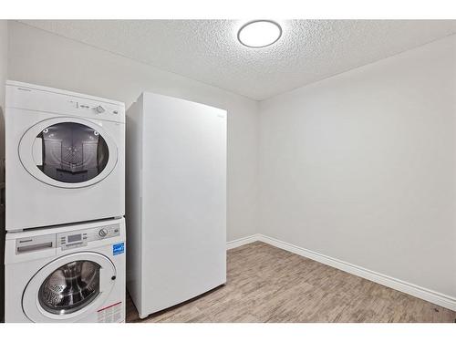 122-1808 36 Avenue Sw, Calgary, AB - Indoor Photo Showing Laundry Room