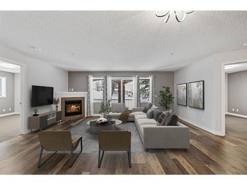 122-1808 36 Avenue Sw, Calgary, AB - Indoor Photo Showing Living Room With Fireplace