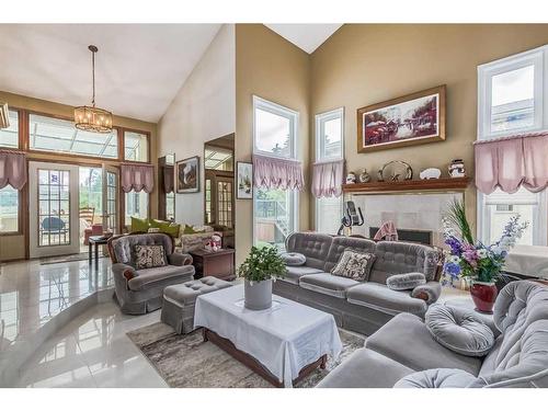 852 Shawnee Drive Sw, Calgary, AB - Indoor Photo Showing Living Room With Fireplace