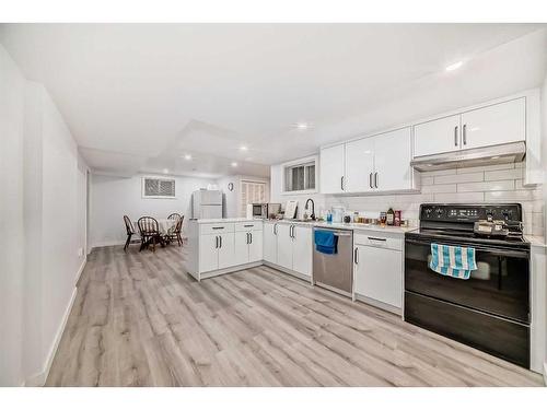 610 69 Avenue Sw, Calgary, AB - Indoor Photo Showing Kitchen