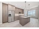 1402-395 Skyview Parkway Ne, Calgary, AB  - Indoor Photo Showing Kitchen With Stainless Steel Kitchen With Upgraded Kitchen 