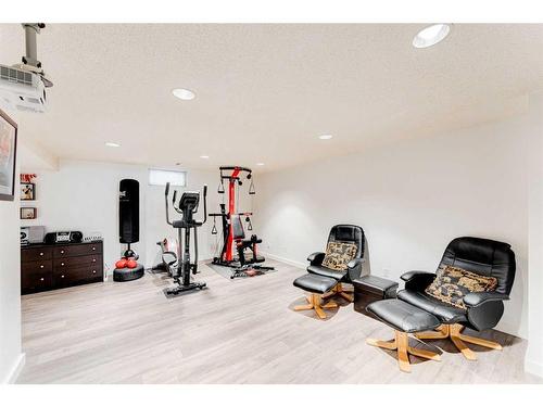 11140 Braeside Drive Sw, Calgary, AB - Indoor Photo Showing Gym Room