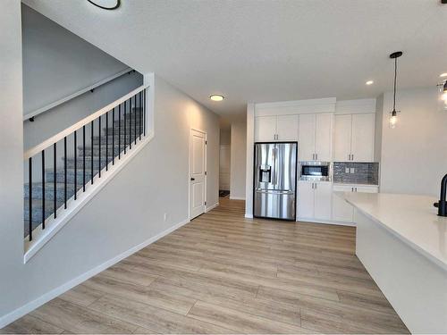 193 Lucas Place Nw, Calgary, AB - Indoor Photo Showing Kitchen With Stainless Steel Kitchen