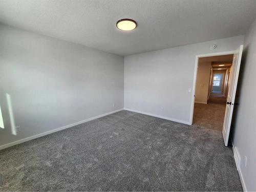 193 Lucas Place Nw, Calgary, AB - Indoor Photo Showing Other Room