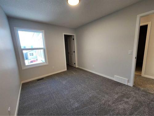 193 Lucas Place Nw, Calgary, AB - Indoor Photo Showing Other Room