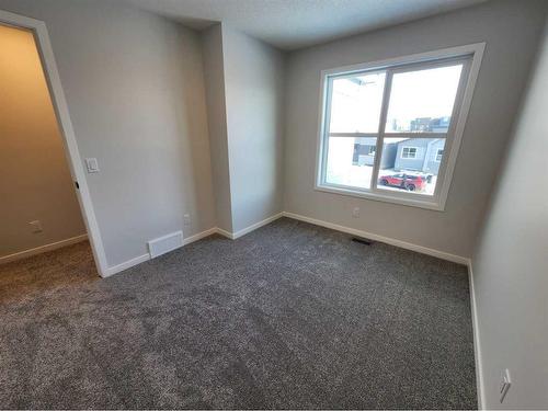 193 Lucas Place Nw, Calgary, AB - Indoor Photo Showing Other Room