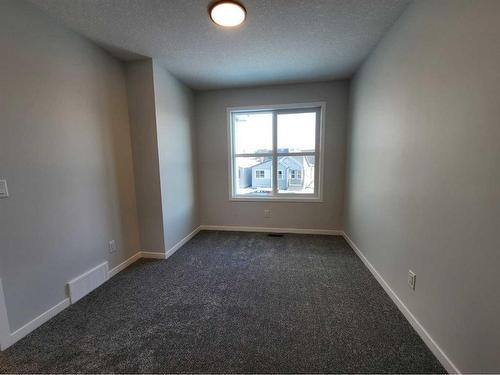 193 Lucas Place Nw, Calgary, AB - Indoor Photo Showing Other Room