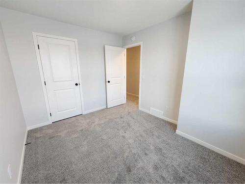 193 Lucas Place Nw, Calgary, AB - Indoor Photo Showing Other Room