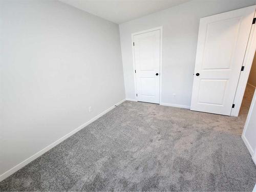 193 Lucas Place Nw, Calgary, AB - Indoor Photo Showing Other Room