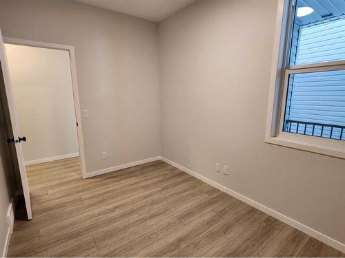 193 Lucas Place Nw, Calgary, AB - Indoor Photo Showing Other Room