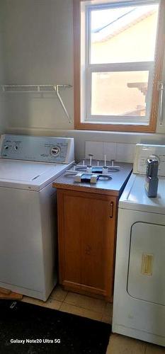 244 Los Alamos Place Ne, Calgary, AB - Indoor Photo Showing Laundry Room