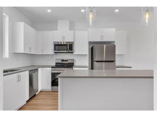 845 South Point Gate Sw, Airdrie, AB - Indoor Photo Showing Kitchen With Stainless Steel Kitchen