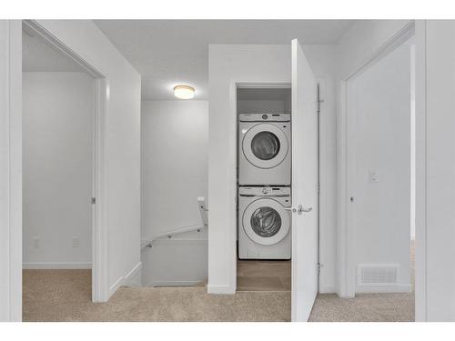 845 South Point Gate Sw, Airdrie, AB - Indoor Photo Showing Laundry Room