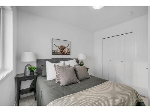 816 South Point Heath Sw, Airdrie, AB - Indoor Photo Showing Bedroom