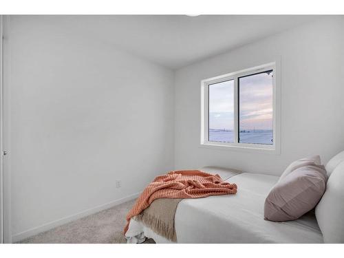 816 South Point Heath Sw, Airdrie, AB - Indoor Photo Showing Bedroom