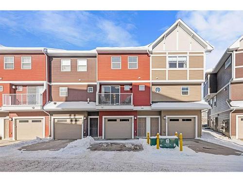 204-1225 Kings Heights Way Se, Airdrie, AB - Outdoor With Balcony With Facade