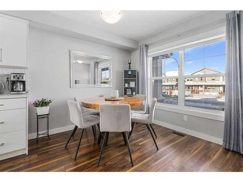 204-1225 Kings Heights Way Se, Airdrie, AB - Indoor Photo Showing Dining Room