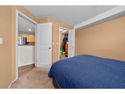 2307-505 Railway Street West, Cochrane, AB - Indoor Photo Showing Bedroom