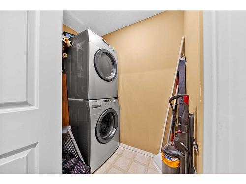 2307-505 Railway Street West, Cochrane, AB - Indoor Photo Showing Laundry Room