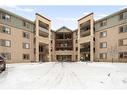 2307-505 Railway Street West, Cochrane, AB  - Outdoor With Balcony With Facade 