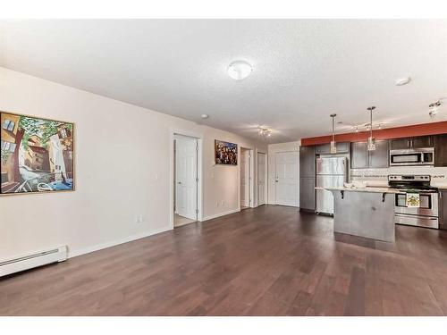 1204-279 Copperpond Common Se, Calgary, AB - Indoor Photo Showing Kitchen With Stainless Steel Kitchen