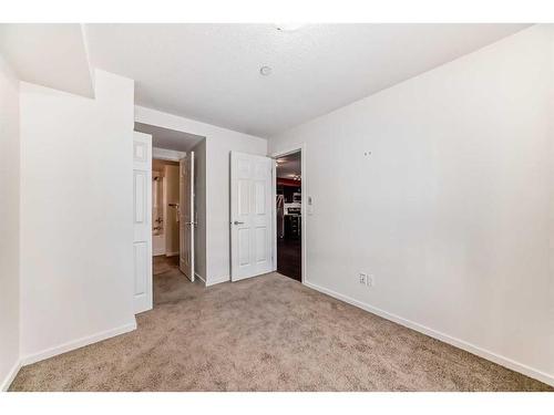 1204-279 Copperpond Common Se, Calgary, AB - Indoor Photo Showing Other Room