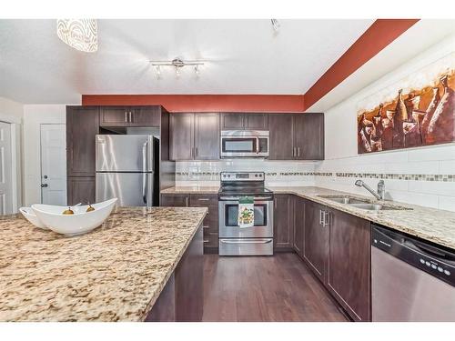 1204-279 Copperpond Common Se, Calgary, AB - Indoor Photo Showing Kitchen With Stainless Steel Kitchen With Double Sink