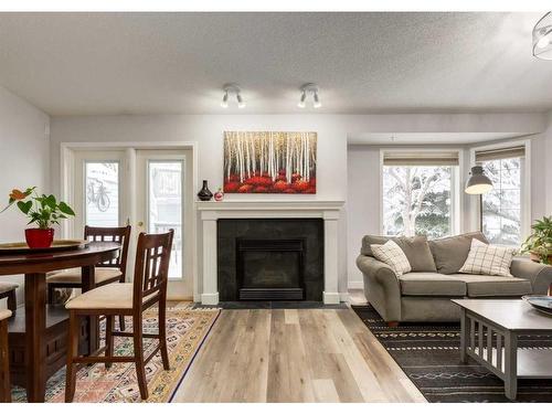 159 Valley Ridge Heights Nw, Calgary, AB - Indoor Photo Showing Living Room With Fireplace