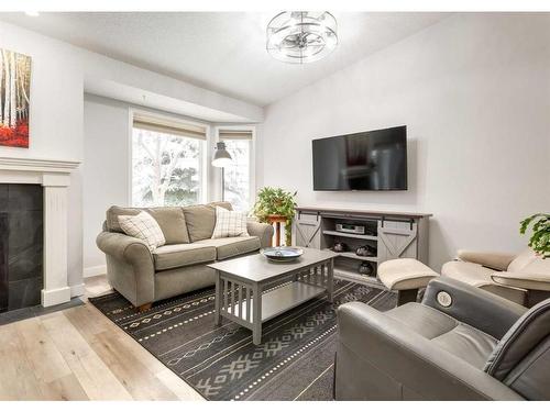 159 Valley Ridge Heights Nw, Calgary, AB - Indoor Photo Showing Living Room With Fireplace