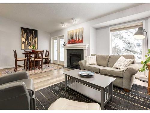 159 Valley Ridge Heights Nw, Calgary, AB - Indoor Photo Showing Living Room With Fireplace