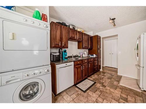 135 Carr Crescent, Okotoks, AB - Indoor Photo Showing Laundry Room