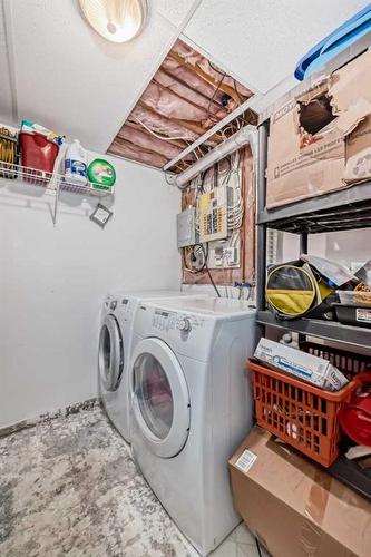 135 Carr Crescent, Okotoks, AB - Indoor Photo Showing Laundry Room